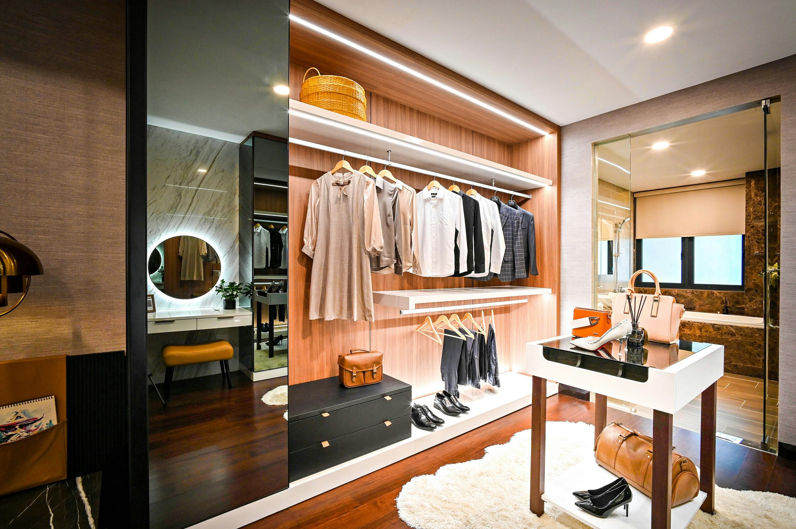 Clothing organized on closet rails and shelves