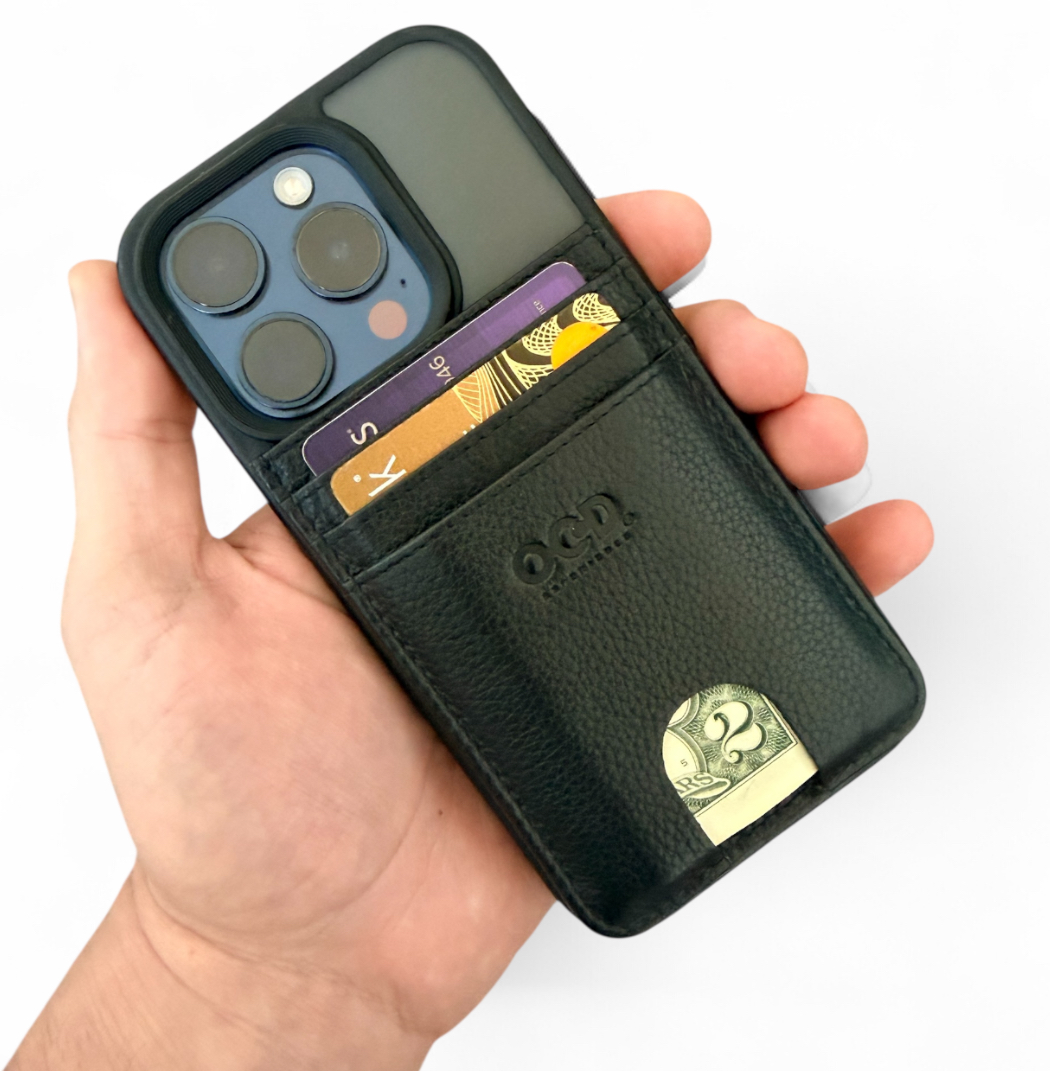 O.C.D. MagSafe Wallet held in hand with cards and cash inserted